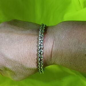 Pair of Silvertone twisted Bangle bracelets